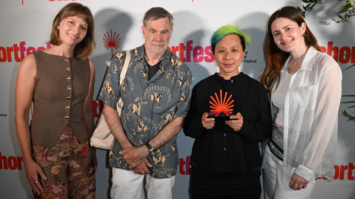 Gus Van Sant poses with Jen Nee Lim, who holds her Best of Festival award for Fruit at ShortFest 2026.