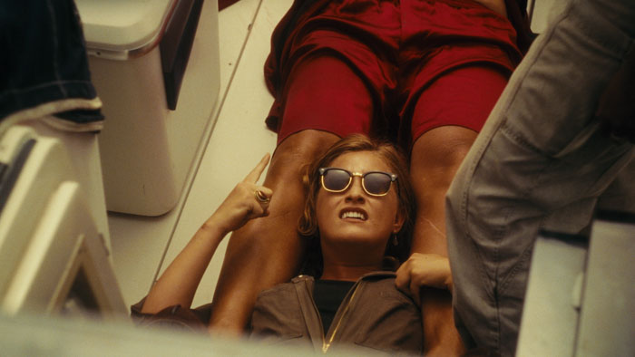 Alice (Cora Cleary) lies on a boat deck in Rolling.