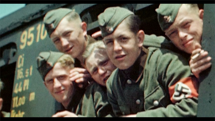 Nazi soldiers look out from a train in This Ordinary Thing.