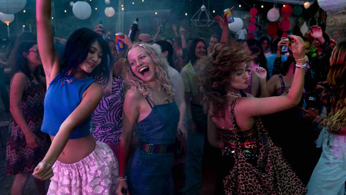 Inken, Vicky, and Lena dance together at a nighttime party in Hot Girl Summer.