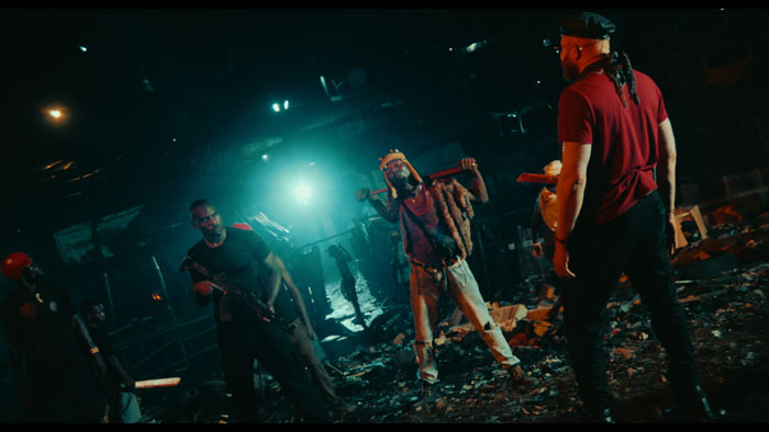 Armed men face off during a violent confrontation in Son of the Soil.