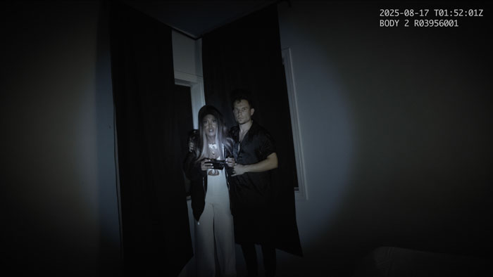 Haley (Branika Scott) and Henry (George Henry Horton) investigate their darkened home in Strawstalker.