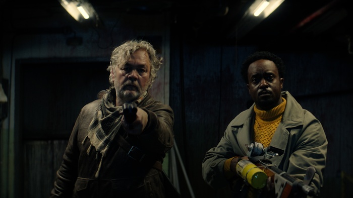 Belko (Mark Kelly) and Lamont Guest (Morgan McLeod) armed for a vampire hunt in Blood & Rust.