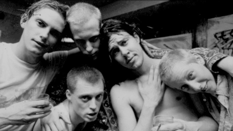 Candid black-and-white photo of the Butthole Surfers in Butthole Surfers: The Hole Truth and Nothing Butt.