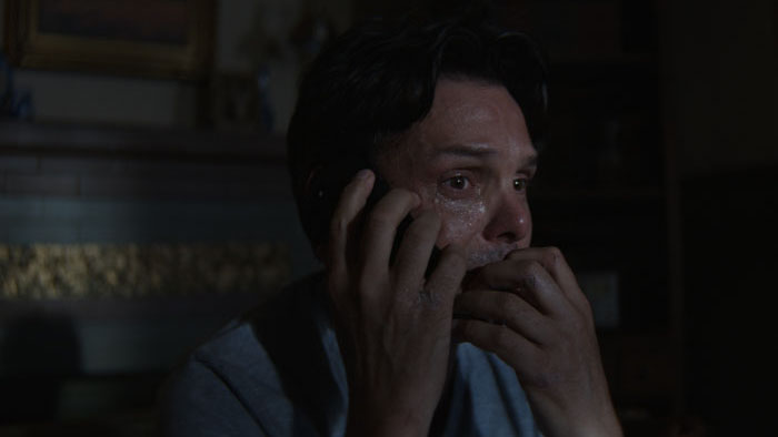 Jack (Hamish Sturgeon) cries on the phone in a tense moment from Gossamer.