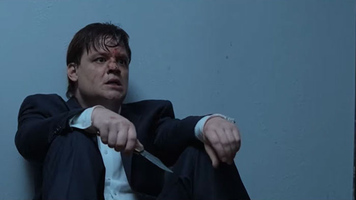 Jake Keller (Jason Nancarrow) sits bloodied and armed with a knife in Carousel.